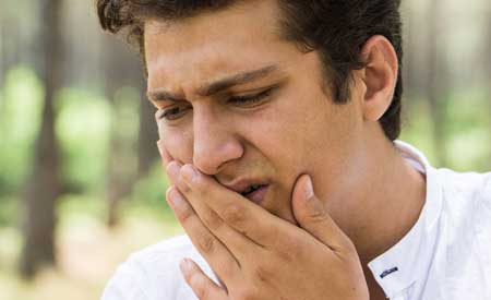 Man having toothache