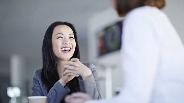 Woman having good teeth laughing