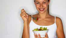 Girl eating healthy salad