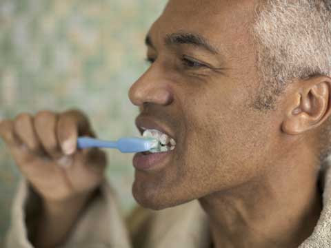 Man brushing his teeth