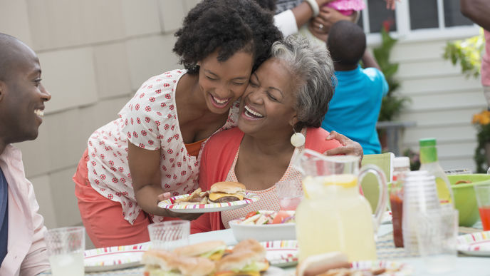 Mother and Daughter Eating together