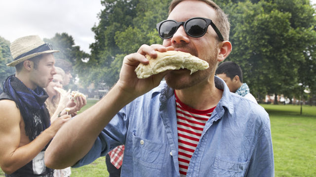 Man eating fast food