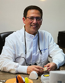 Dr. Morris De Leon